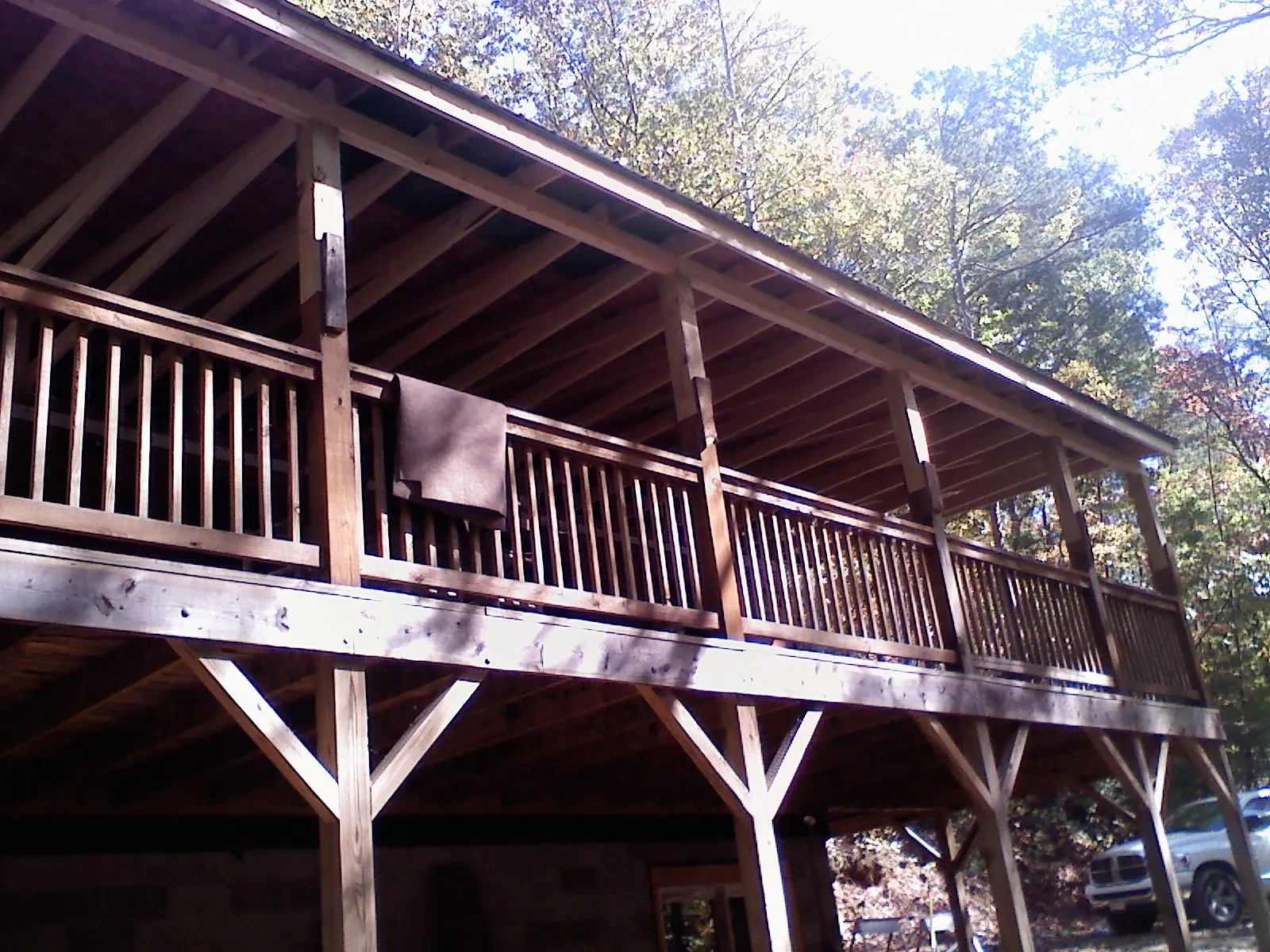 Timber framing under a new elevated porch and deck — Roof Leak Repair in Hinckley by Roofing Brothers